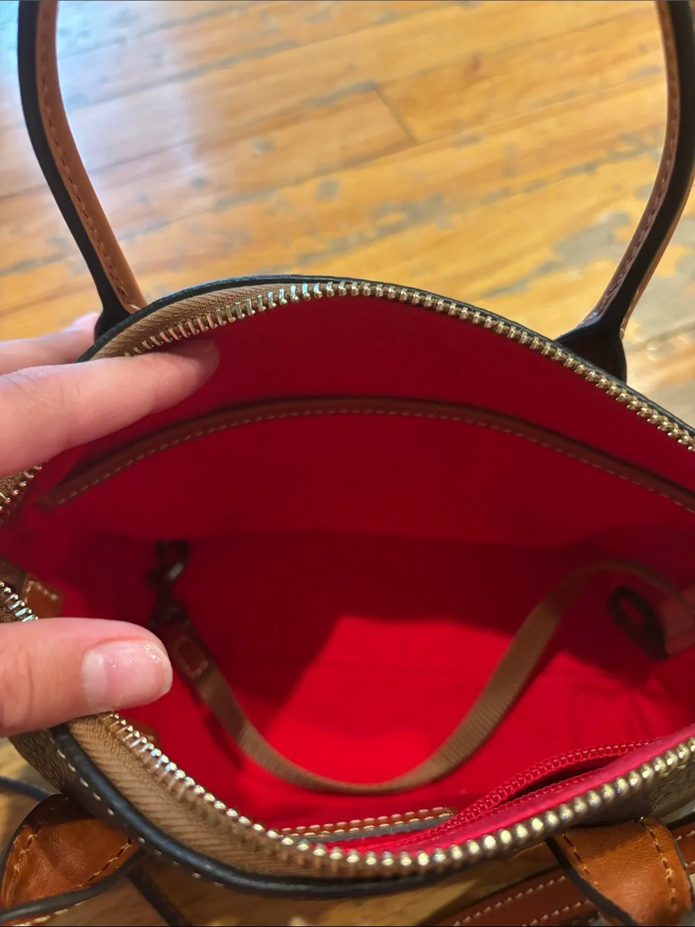Dooney & Bourke Black Pebbled Leather Crossbody with Brown Trim
